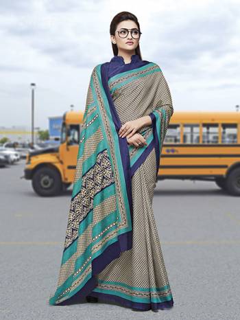 Here Is Very Pretty Printed Saree Fabricated On Satin Silk Paired With Running Blouse, This Pretty Formal Printed Saree Is Best Suitable For Your Work Place As It Is Light Weight And Esnures Superb Comfort All Day Long. Also It Can Be Used As Uniform At Different Places Like Airports, Hospitals And Hotels. Buy Now