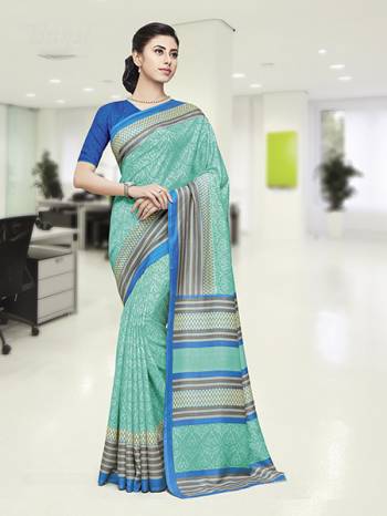 Comfort Is The First Priority When You Go To Your Work Place. So?Keeping Your Comfort In Mind This Printed Saree Is Designed As A Uniform For Your Work Place. This Saree And Blouse are Fabricated On Satin Silk Beautified With Prints Which Is Also Light In Weight And Easy To Carry All Day Long