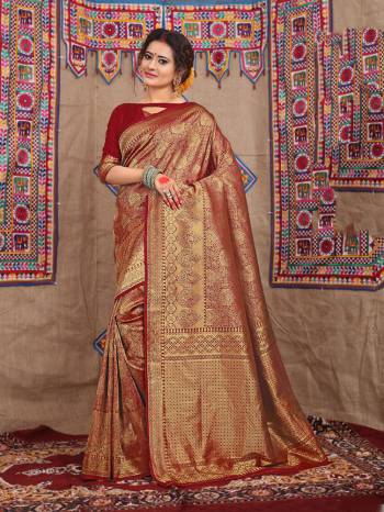 Celebrate This Festive Season With Beauty And Comfort Wearing This Designer Silk Based Saree In Maroon Color. This Saree Is Fabricated On Jacquard Silk Beautified With Attractive Weave Paired With Art Silk Fabricated Blouse. 