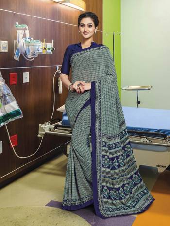 Here Is Very Pretty Printed Saree Fabricated On Poly Cotton Paired?With Running Blouse, This Pretty Formal Printed Saree Is Best Suitable For Your Work Place As It Is Light Weight And Esnures Superb Comfort All Day Long. Also It Can Be Used As Uniform At Different Places Like Airports, Hospitals And Hotels. Buy Now