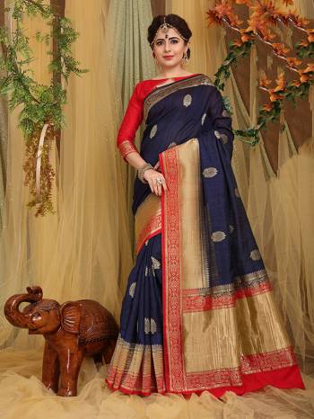 Look Pretty In This Designer Silk Based Saree Beautified With Weave All Over. Its Rich Fabric And Unique Weave Pattern Will Earn You Lots Of Compliments From Onlookers.