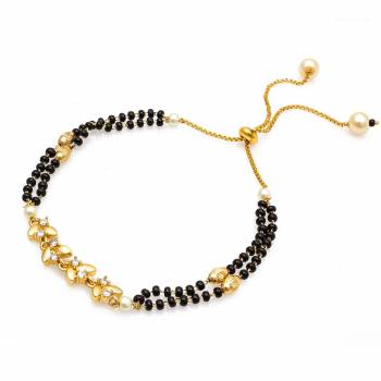 Grab This New And Trendy Mangalsutra Bracelet In Golden And Black Color. This Pretty Bracelet Can Be Paired With Any Kind Of Attire And Can Be Used As Daily Wear Instead Of Mangalsutra.