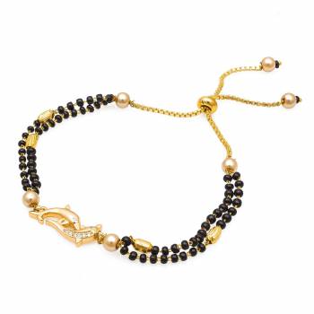 Grab This New And Trendy Mangalsutra Bracelet In Golden And Black Color. This Pretty Bracelet Can Be Paired With Any Kind Of Attire And Can Be Used As Daily Wear Instead Of Mangalsutra.