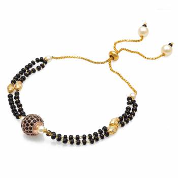 Grab This New And Trendy Mangalsutra Bracelet In Golden And Black Color. This Pretty Bracelet Can Be Paired With Any Kind Of Attire And Can Be Used As Daily Wear Instead Of Mangalsutra.