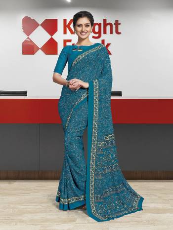 Comfort Is The First Priority When You Go To Your Work Place. So?Keeping Your Comfort In Mind This Printed Saree Is Designed As A Uniform For Your Work Place. This Saree And Blouse are Fabricated On Poly Cotton Beautified With Prints Which Is Also Light In Weight And Easy To Carry All Day Long