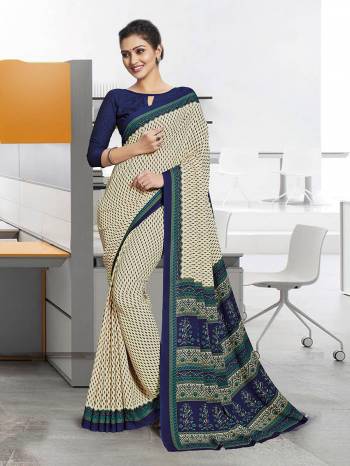 No More Worry For What To Wear At Your Place, Grab This Poly Cotton Fabricated Saree And Blouse Beautified With Prints All Over. This Saree Can Be Used As Uniform At Different Places Like Airports, Hospitals And Hotels