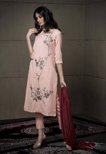 Look Pretty In This Designer Straight Cut Suit In Light Peach Color Paired With Contrasting Maroon Colored Dupatta. Its Embroidered Top Is Fabricated On Cotton Linen Paired With Cotton Bottom And Chiffon Dupatta. It Has Rich And Subtle Thread Work Over The Top. 