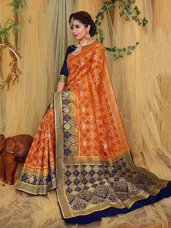 Look Pretty In This Designer Silk Based Saree Beautified With Weave All Over. Its Rich Fabric And Unique Weave Pattern Will Earn You Lots Of Compliments From Onlookers