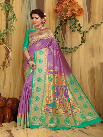 Grab This Beautiful Designer Silk Based Saree Which Gives A Rich?Look To Your Personality. This Saree Is Fabricated On Jacquard Silk Paired With Art Silk Fabricated Blouse, Beautified With Weave