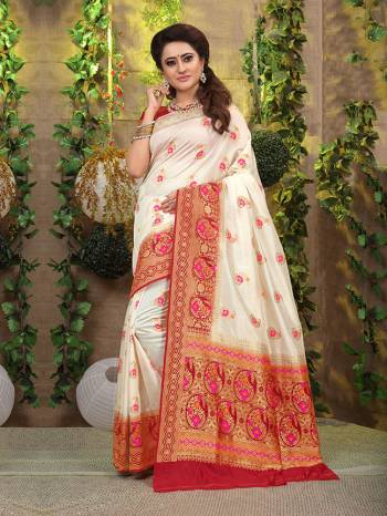 This Festive Season Look The Most Elegant Of All Wearing This Designer Silk based Saree Beautified With Weave. This Saree Is Light Weight, Durable And Easy To Carry Throughout The Gala