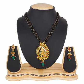 Grab This Heavy Multiple Chained Magalsutra With A Heavy Designer Pendant. This Mangalsutra Can Be Paired With Any Colored Traditional Attire. Buy Now.