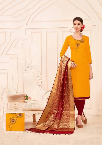 Celebrate This Festive Season With Ease And Comfort Wearing This Designer Suit In Musturd Yellow Colored Top Paired With Contrasting Maroon Colored Bottom And Dupatta. Its Hand Embroidered Top Is Fabricated On Cotton Slub Paired With Cotton BottomAnd Banarasi Art Silk Dupatta. Buy This Dress Material Now.