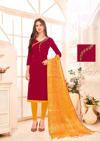 Celebrate This Festive Season With Ease And Comfort Wearing This Designer Suit In Maroon Colored Top Paired With Contrasting Musturd Yellow Colored Bottom And Dupatta. Its Hand Embroidered Top Is Fabricated On Cotton Slub Paired With Cotton BottomAnd Banarasi Art Silk Dupatta. Buy This Dress Material Now.