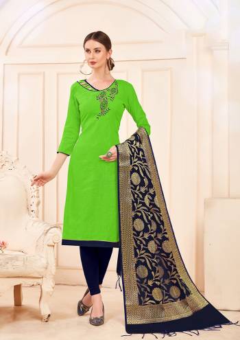 Enhance Your Personality Wearing This Designer Straight Suit In Parrot Green Color Paired With Contrasting Navy Blue Colored Bottom And Dupatta, Its Top Is Fabricated On Cotton Slub Paired With Cotton Bottom And Banarasi Art Silk Dupatta. It Is Beautified With Attractive Hand Work Over The Top.