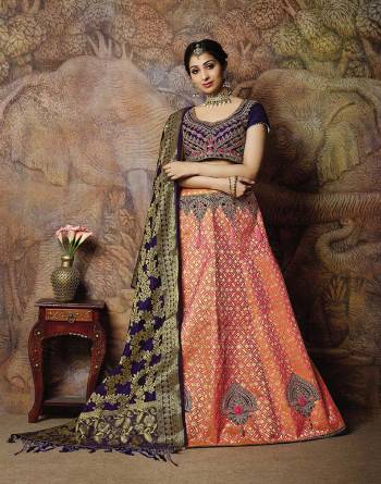 Attract All Wearing This Heavy Designer Lehenga Choli In Violet Colored Blouse Paired With Dark Peach Colored Lehenga And Violet Colored Dupatta. This Silk Based Lehenga Choli Is Beautified With Heavy Weave And Subtle Embroidery. Its Lehenga And Dupatta Are Fabricated On Jacquard Silk Paired With Art Silk Fabricated Blouse. Buy Now.