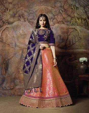 Attract All Wearing This Heavy Designer Lehenga Choli In Violet Colored Blouse Paired With Pink Colored Lehenga And Violet Colored Dupatta. This Silk Based Lehenga Choli Is Beautified With Heavy Weave And Subtle Embroidery. Its Lehenga And Dupatta Are Fabricated On Jacquard Silk Paired With Art Silk Fabricated Blouse. Buy Now.