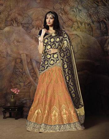 Catch All The Limelight In The Next Wedding You Attend With This Designer Lehenga Choli In Navy Blue Colored Blouse Paired With Contrasting Peach Colored Lehenga And Navy Blue Colored Dupatta. Its Lehenga Are Dupatta Are Fabricated On Jacquard Silk PAired With Art Silk Fabricated Blouse. 