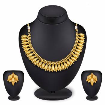 Rich And Elegant Looking Designer Necklace Set Is Here In Golden Color. This Beautifully Crafted Designer Set Can Be Paired With Any Colored Ethnic Attire Which Gives An Elegant Look To The Neckline. Buy Now.