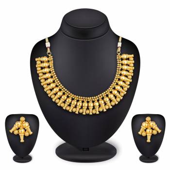 Rich And Elegant Looking Designer Necklace Set Is Here In Golden Color. This Beautifully Crafted Designer Set Can Be Paired With Any Colored Ethnic Attire Which Gives An Elegant Look To The Neckline. Buy Now.