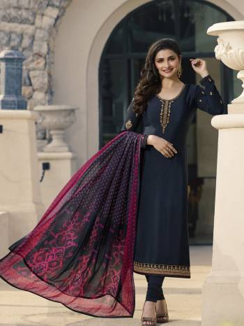 Enhance Your Personality Wearing This Designer Straight Cut Suit In Navy Blue Color Paired With Contrasting Navy Blue And Pink Colored Dupatta. This Dress Material Is Crepe Based Paired With Chiffon Fabricated Dupatta. 