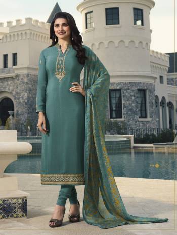 New English Shade Is Here With This Designer Straight Suit In Steel Blue Color. This Pretty Dress Material Is Fabricated On Crepe Paired With Chiffon Fabricated Dupatta. Buy This Suit Now.