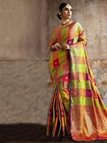 Go Colorful With This Designer Silk Based Saree In Multi Color Paired With Orange Colored Blouse. This Saree And Blouse Are Fabricated On Art Silk beautified With Attractive Weave In Checks Pattern. Buy Now.