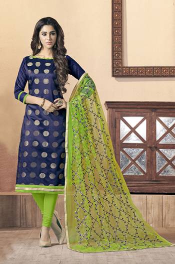 Enhance Your Persoanlity Wearing This Designer Straight Suit In Navy Blue Colored Top Paired With Parrot Green Colored Bottom And Dupatta. It Top Is Fabricated On Soft Banarasi Jacquard Paired With Cotton Bottom And Chiffon Fabricated Dupatta. Buy This Dress Material Now.