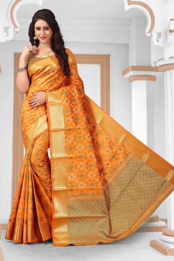 Look Pretty In This Designer Silk Based Saree Beautified With Weave All Over. Its Rich Fabric And Unique Weave Pattern Will Earn You Lots Of Compliments From Onlookers