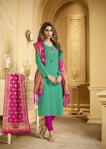 Simple And Elegant Looking Dress Material Is Here In Sea Green Colored Top Paired With Contrasting Rani Pink Colored Bottom And Dupatta. Its Top And Bottom Are Cotton Based Paired With Banarasi Jacquard Fabricated Dupatta. Buy Now.