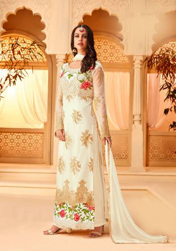 Adorn The Pretty Angelic Look In This Beautiful Designer Straight Suit In All Over White Color. Its Beautiful Embroidered Top Is Fabricated On Net Paired With Santoon Bottom And Chiffon Fabricated Dupatta. Buy Now.