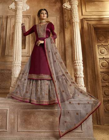 Beautiful Color Pallete Is Here With This Designer Two In One Indo-Western Suit In Magenta Pink Colored Top And Bottom Paired With Contrasting Grey Colored Lehenga And Dupatta. Its Top Is Fabricated On Satin Georgette Paired With Santoon Bottom And Net Fabricated Lehenga And Dupatta. Pair With Any Of The Bottoms As Per Your Convinince. Buy Now.