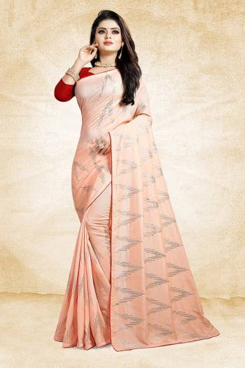 Look Pretty In This Rich And Elegant Looking Designer Saree In Peach Color Paired With Contrasting Red Colored Blouse. This Saree And Blouse Are Silk Based Beautified With Attractive Embroidery. Also It Is Light In Weight And Easy To Carry All Day Long. 