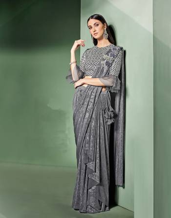 Mindblowing mettalic details and delicate drapes makes this saree a perfect pick for a cocktail night. Go soft with the makeup and sharp with your hairdo to look sensational. 