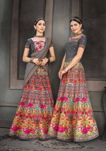 Go Colorful With This Designer Two In One Lehenga Which You Make It As Floor Length Suit Or Lehenga. Its Pretty Blouse And Lehenga are Fabricated On Heritage Art Silk Paired With Chiffon Fabricated Dupatta. It Is Beautified With Digital Prints And Stone Work. Buy This Designer Piece Now.