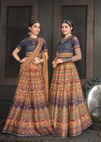 Go Colorful With This Designer Two In One Lehenga Which You Make It As Floor Length Suit Or Lehenga. Its Pretty Blouse And Lehenga are Fabricated On Heritage Art Silk Paired With Chiffon Fabricated Dupatta. It Is Beautified With Digital Prints And Stone Work. Buy This Designer Piece Now.