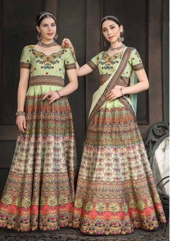 Look Beautiful In This Designer Colorful Two In One Lehenga Choli Dress. This Multi Colored Lehenga Choli Is Fabricated On Heritage Art Silk Beautified With Digital Prints And Stone Work All Over. You Can Get This Stitched As A Floor Length Suit Or Lehenga As Per Your Comfort And Occasion. 