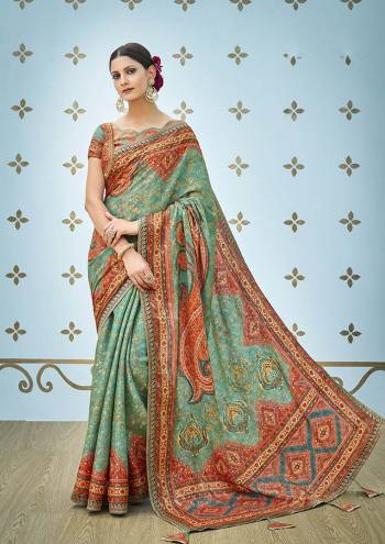 If You Have An Eye For Prints Than Grab This Beautiful Designer Saree With Pretty Digital Prints All Over. This Saree And Blouse Are Fabricated On Banarasi Art Silk Beautified With Stone Work. It Is Light In Weight And Easy To Carry All Day Long. 