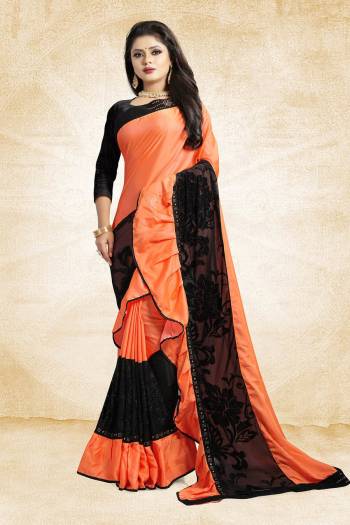 Adopt The Fashion Trend In Your Style With This Designer Frill Saree In Orange And Black Color Paired With Black Colored Blouse, This Saree Is Fabricated On Soft Silk Paired With Art Silk Fabricated Blouse. It Is Beautified with Fancy Lace Border And Frill. Buy This Saree Now.