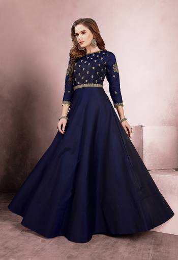 Enhance Your Personality Wearing This Designer Readymade Gown In Navy Blue Color Fabricated Taefta Silk. It Is Beautified With Attractive Minimal Embroidery Over The Yoke And Sleeves. Buy This Readymade Gown Now.