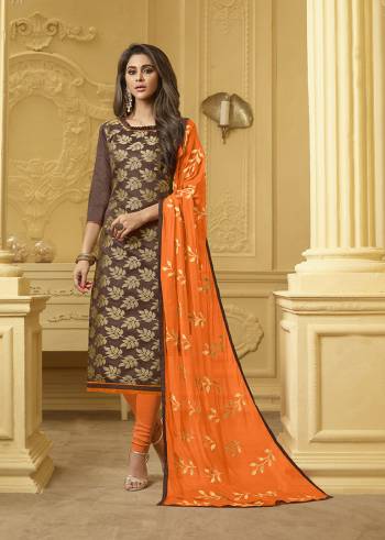 Look Pretty In This Designer Dress Material In Brown Colored Top Paired With Contrasting Orange Colored Bottom And Dupatta. Its Top Is Jacquard Silk Fabricated Paired With Cotton Bottom And Chiffon Fabricated Dupatta. Buy Now.