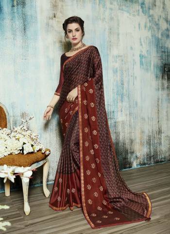 For A Royal Look, Grab This Designer Saree In Maroon And Brown Color Paired With Maroon And Brown Colored Blouse. This Saree Is Fabricated On Georgette Paired With Art Silk Fabricated. With Beauty This Saree Also Ensures Superb Comfort All Day Long. 