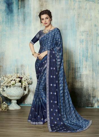 Grab This Pretty Saree For Your Semi-Casual Wear In Blue Color Paired Blue Colored Blouse. This Saree IS Georgette Based Paired With Art Silk Fabricated Blouse. Buy Now.