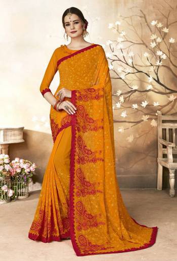 Bright And Visually Appealing Color Is Here With This Designer Saree In Orange Color Paired With Orange Colored Blouse. This Heavy Embroidered Saree Is Georgette Based Paired With Art Silk Fabricated Blouse. Buy This Saree Now.