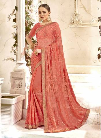 Shine Bright Wearing This Heavy Designer Saree In Dark Peach Color Paired With Dark PeachColored Blouse. This Saree And Blouse are Georgette Based Beautified With Attractive Heavy Embroidery And Stone Work. 