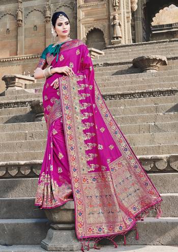 Grab This Beautiful Designer Silk Based Saree Which Gives A Rich?Look To Your Personality. This Saree Is Fabricated On Banarasi Art Silk, Beautified With Weave All Over It. 