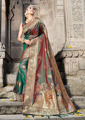 Look Pretty In This Designer Silk Based Saree Beautified With Weave All Over. Its Rich Banarasi Art Silk Fabric And Unique Weave Pattern Will Earn You Lots Of Compliments From Onlooker