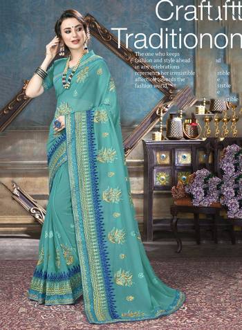 Here Is A Very Pretty Designer Saree In Turquoise Blue Color Paired With Turquoise Blue Colored Blouse. This Saree And Blouse Are Georgette Based Beautified With Heavy Jari And Thread Work. 