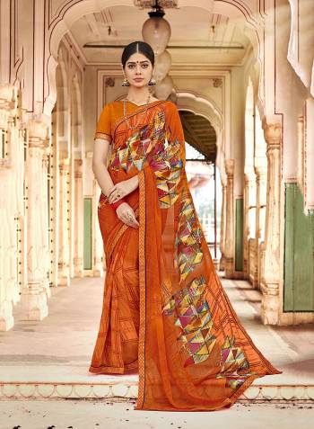 For A Royal Look, Grab This  Printed Saree In Georgette Fabricated Paired With Georgette Blouse.  Grab This Pretty Light Weight Saree. Buy Now.