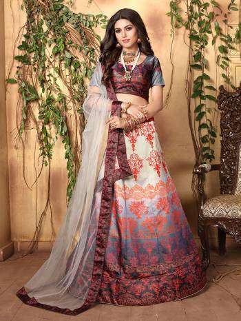 Grab This Designer Colorful Lehenga Choli Fabricated On Jari Satin Paired With Net Fabricated Dupatta. Its Blouse And Lehenga Are Beautified With Digital Prints And Dupatta With Stone Work. Buy This Designer Piece Now. 