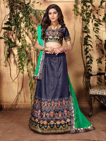 Grab This Designer Colorful Lehenga Choli Fabricated On Jari Satin Paired With Net Fabricated Dupatta. Its Blouse And Lehenga Are Beautified With Digital Prints And Dupatta With Stone Work. Buy This Designer Piece Now. 